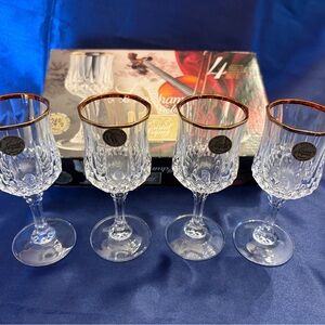 Set of four Cristal d'Arques Longchamp 24% lead crystal liqueur glasses.
